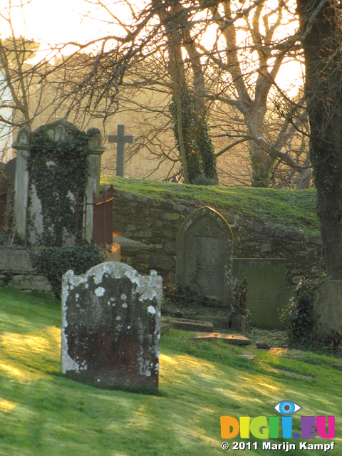 SX17380 Shadows and sunlight on gravestones at St David's Cathedral